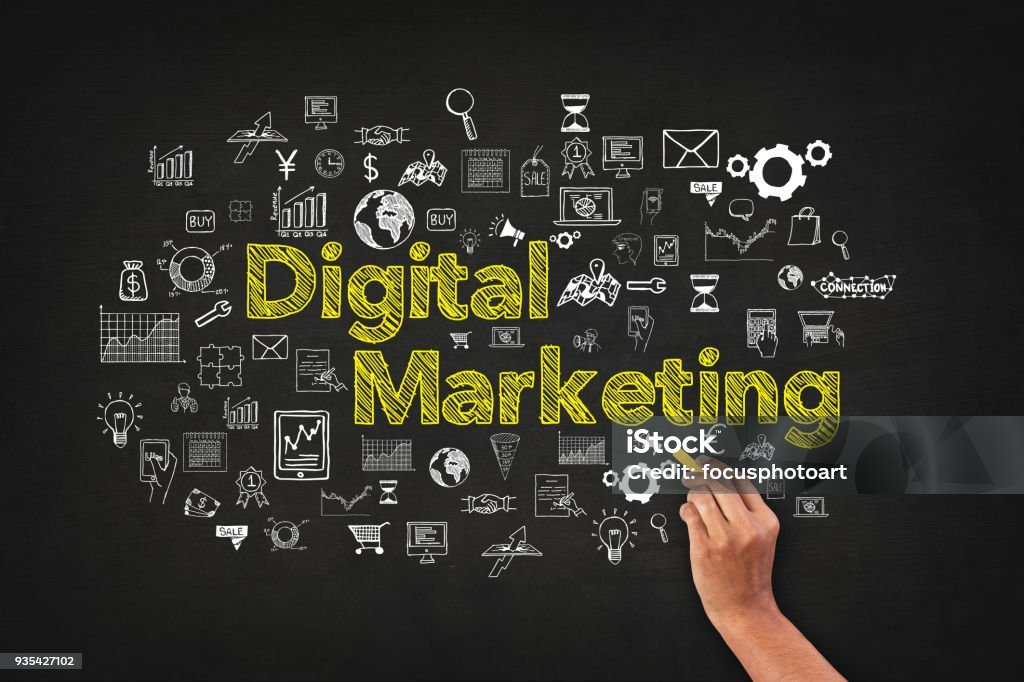 Digital Marketing Word On Blackboard With Supportive Icons